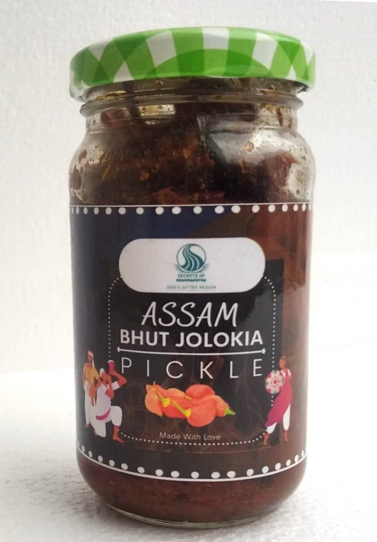 Image of Natural Assam Bhut Jolokia Pickle. Bhut Jolokia acts as a natural painkiller and also improves body metabolism and promotes weight loss. It saves you from the heat in summer and from cold in winter. Secrets of Brahmaputra sells products that include organic food, spices, pickles, teas, Bamboo products and natural items that are sourced and manufactured in the North East of India. It is a North East Farms Sales Endeavour. All profits are shared with farmers from the North East of India