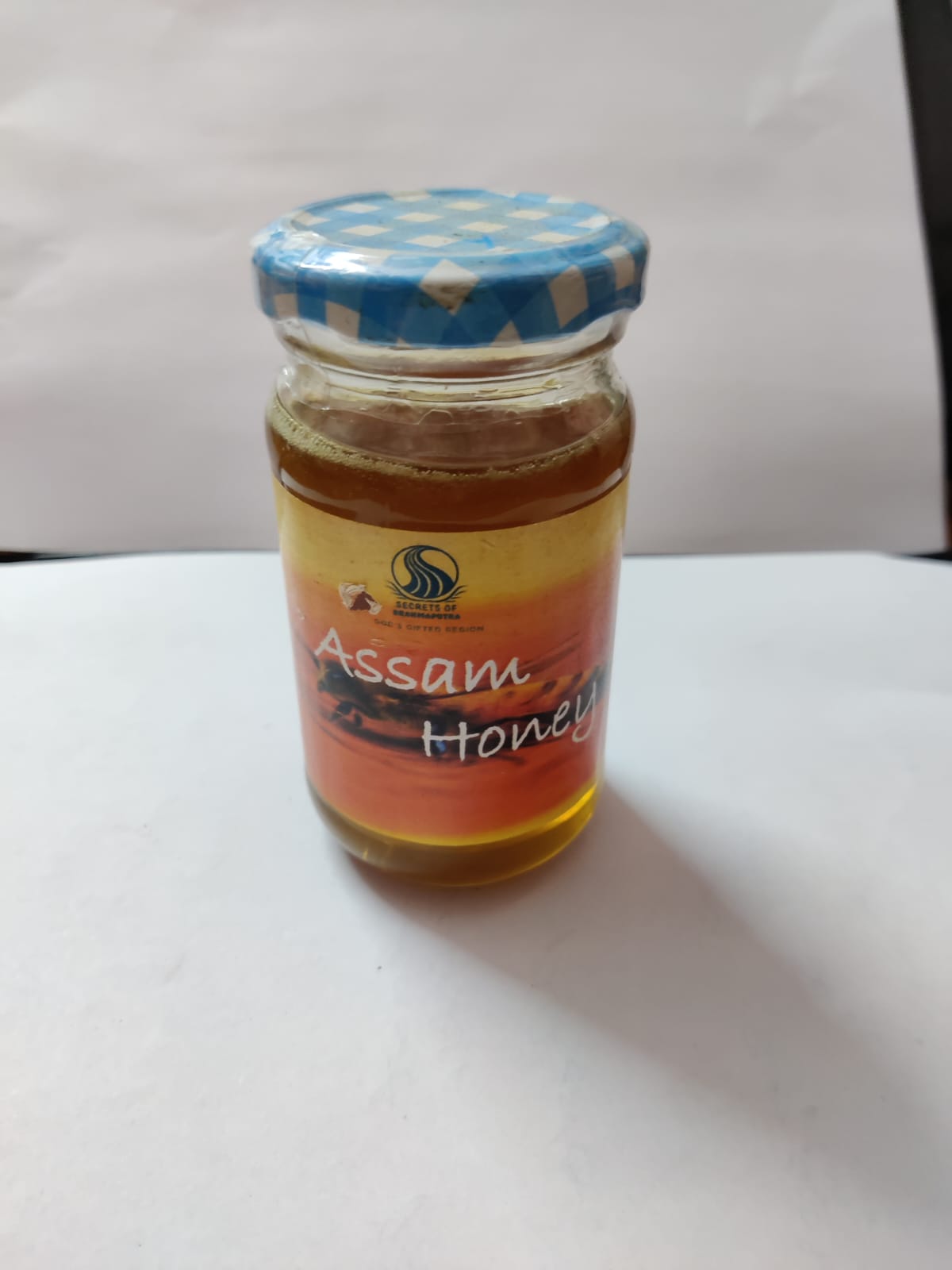 Image of Assam honey are is rich in antioxidants, improves cholesterol, reduces triglyceride levels. It heals burns and wounds when applied externally.  Secrets of Brahmaputra sells natural, organic and healthy food that includes organic rice, spices, pickles, teas, bamboo products and other natural items from the North East of India. 